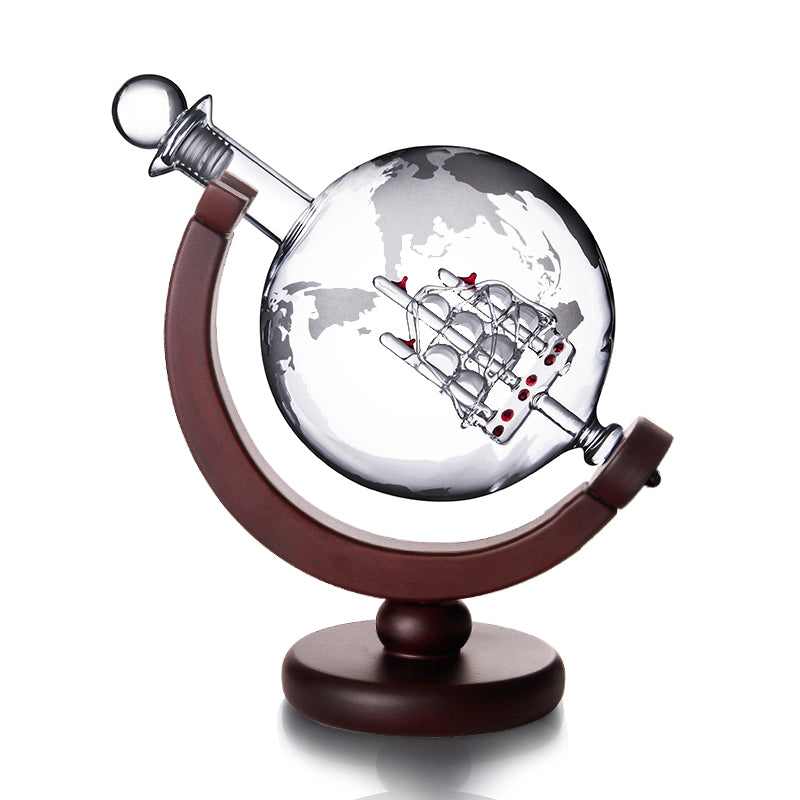 Stylish barware globe decanter set displayed in a home bar setting