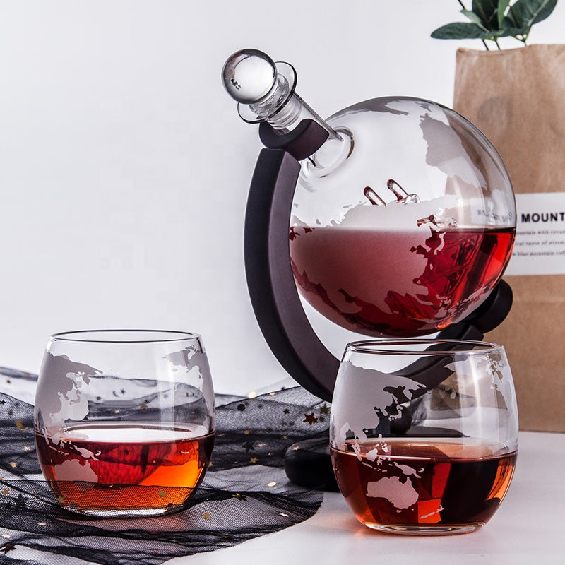 800ml glass globe decanter resting securely on its custom wooden frame.