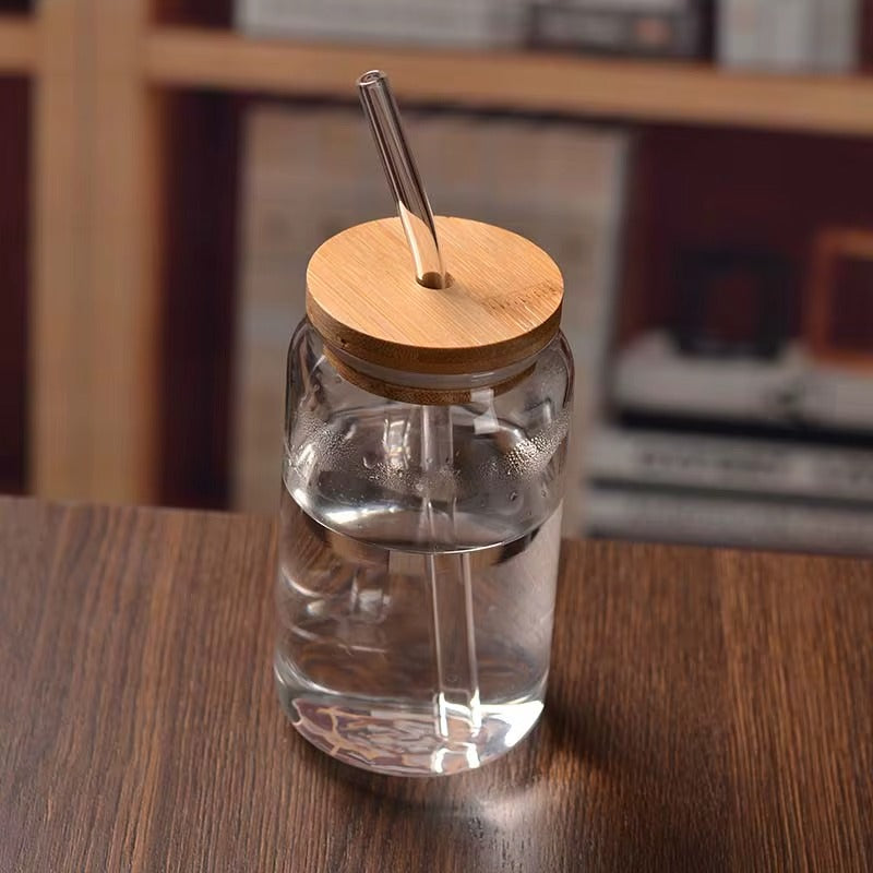 Reusable 360ml glass cup with bamboo lid, perfect for ice cold drinks and smoothies.